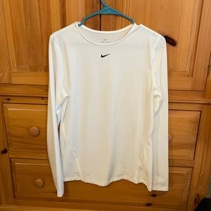 women’s white Nike, Size Large dri-fit shirt.